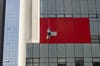 photo of man cleaning the building during daytime