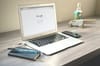 macbook air on grey wooden table