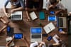 top view photo of people near wooden table