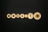 photo of golden cogwheel on black background